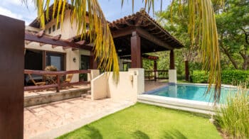 Tropical Balcony with Pool and Garden.